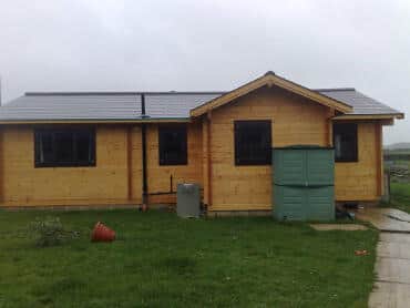 construction-of-log-cabin-with-95mm-laminated-logs-55